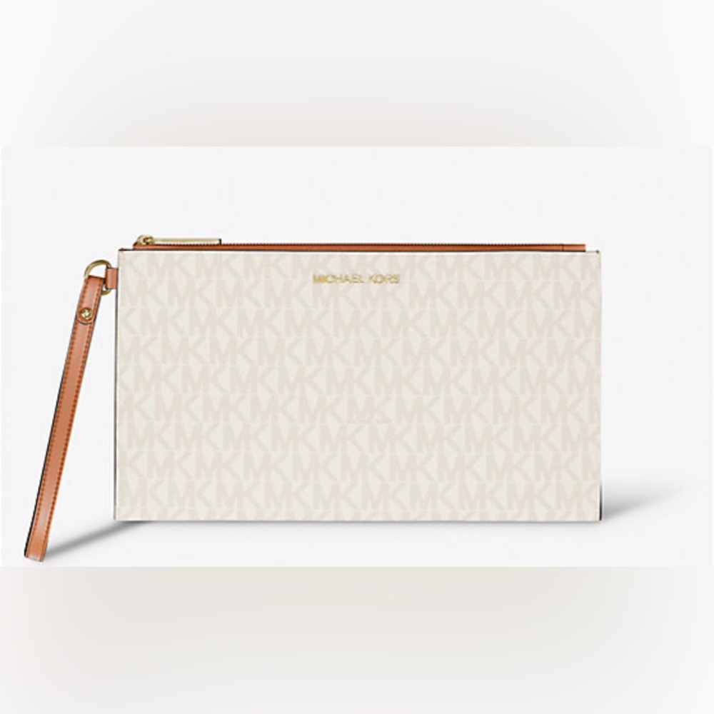 Jet Set Large Signature Logo
Wristlet
New without tags